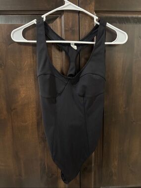 Free people movement black bare it all bodysuit leotard size XS